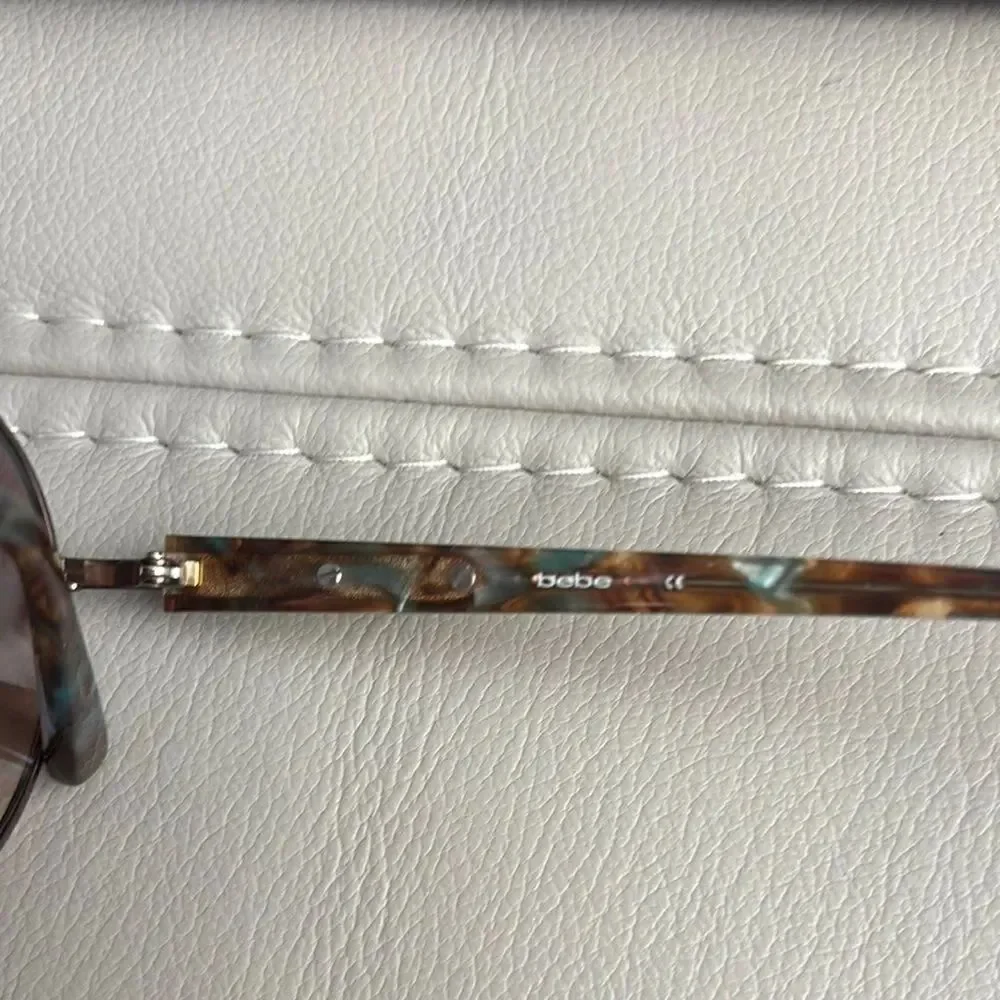 Bebe Round Sunglasses with Swarovski Crystals